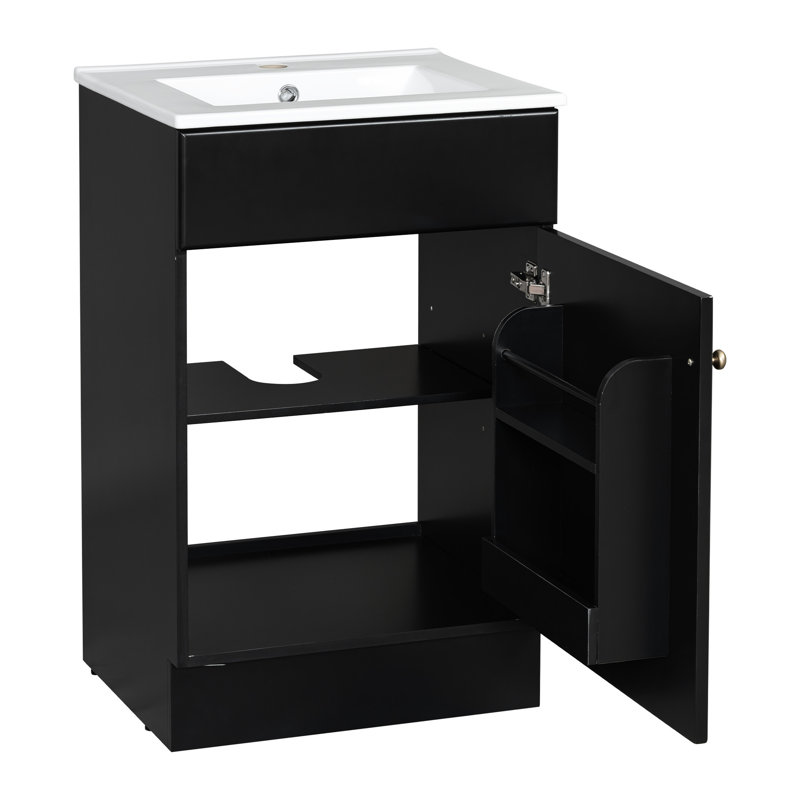 Meuble-lavabo de 20 po avec lavabo, noir. Tablette de porte d'armoire et tablette réglable. Finition lisse du lavabo en céramique. Pour armoire à panneau à utilisation silencieuse. Trou de robinet et surface imperméable. Fermeture silencieuse