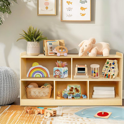 Bibliothèque à deux tablettes avec rangement à cinq sections, conçue comme une bibliothèque pour enfants pour les chambres à coucher, les salles de jeux, les crèches et les jardins d'enfants, avec une finition de couleur naturelle.
