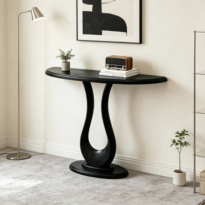 Minimalist semi-circular solid wood console table.