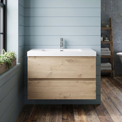 Meuble-lavabo mural en mélamine bois naturel de 107 cm (42 po), résistant à l'usure et aux égratignures, avec une surface non poreuse et facile à nettoyer.