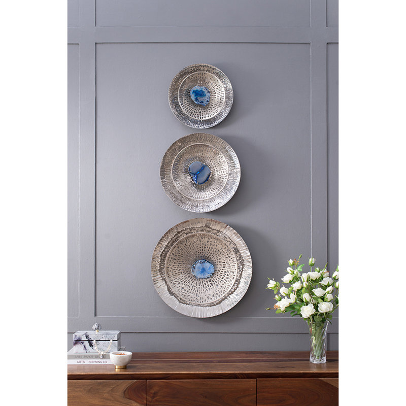 Disque argent texturé surdimensionné