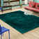Albritton Hand Tufted Teal Area Rug