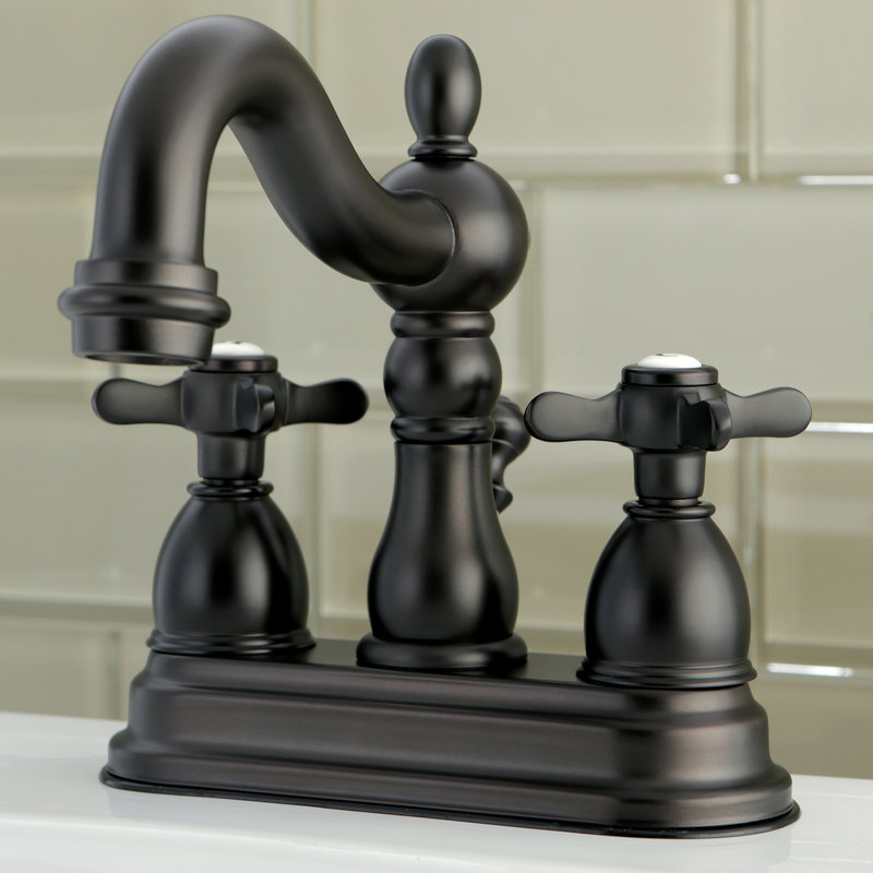 Kingston Brass Essex Two-Handle 3-Hole Deck Mount 4" Centerset Bathroom Faucet with Brass Pop-Up, Oil Rubbed Bronze