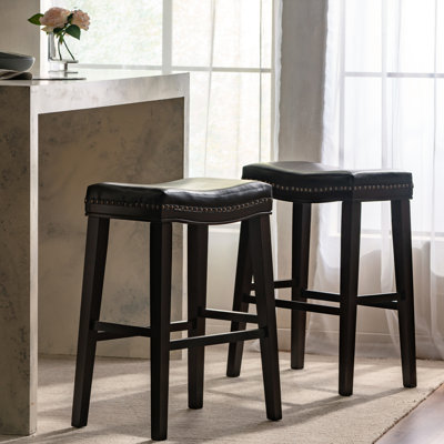Stylish Leather Saddle Stool In Warm Brown Leather, Standing On Rubberwood Comfortable Deep Tone, With