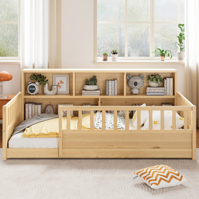 A twin-sized wooden floor bed with a fence-style guardrail, featuring a side storage decorative function, and its color is in the natural wood tone.