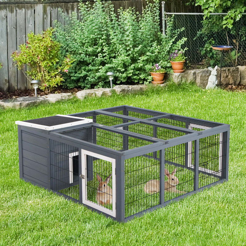 Cage à lapin soigneusement conçue pour les petits animaux de compagnie, assurant confort et jeu, Gris