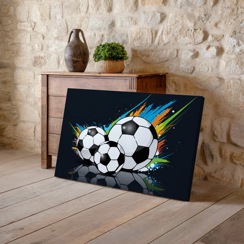 Toile, une illustration dynamique et vibrante mettant en vedette trois ballons de soccer stylisés dans un art mural