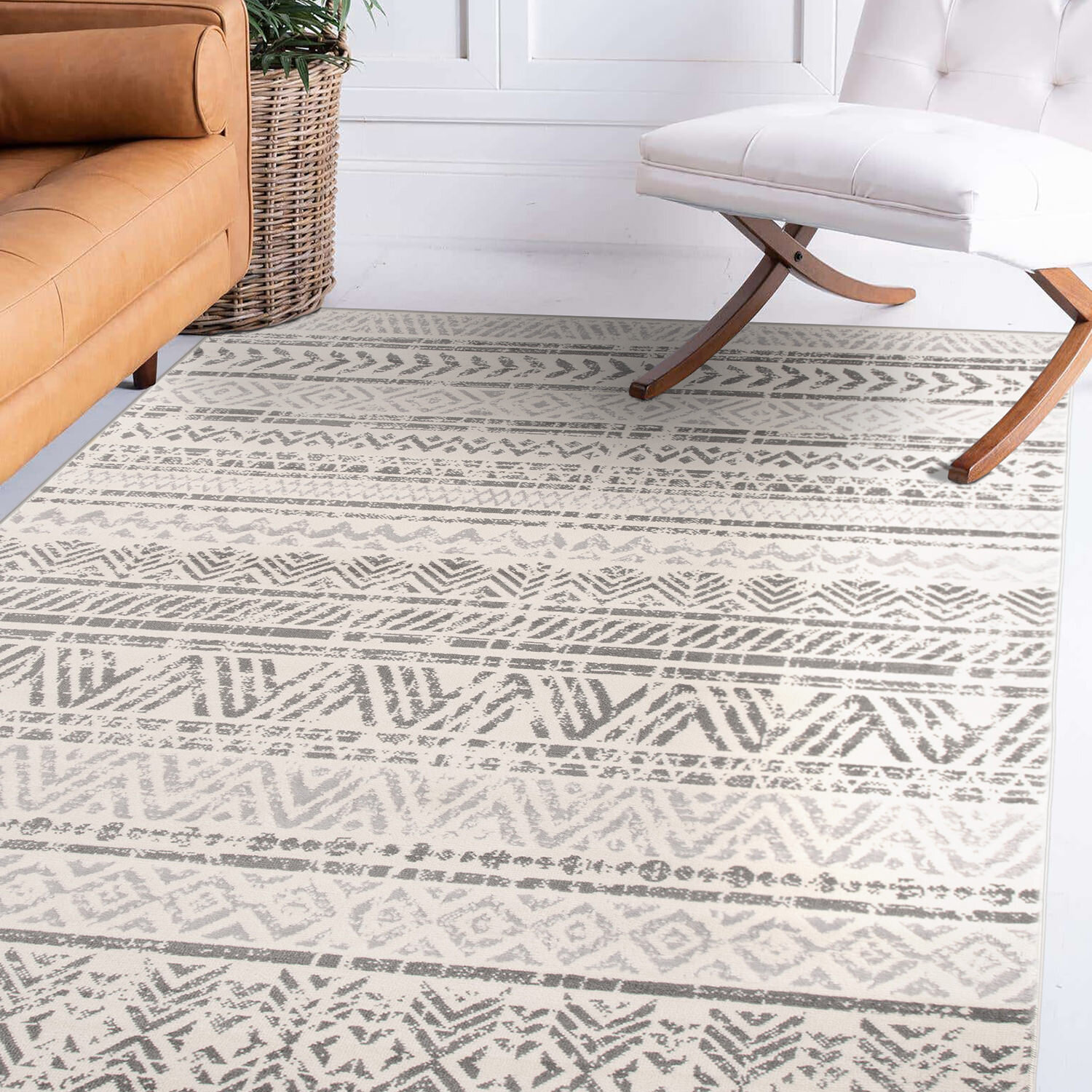 Kitchen with Black and White Diamond Woven Rug on Gray Wash Wood