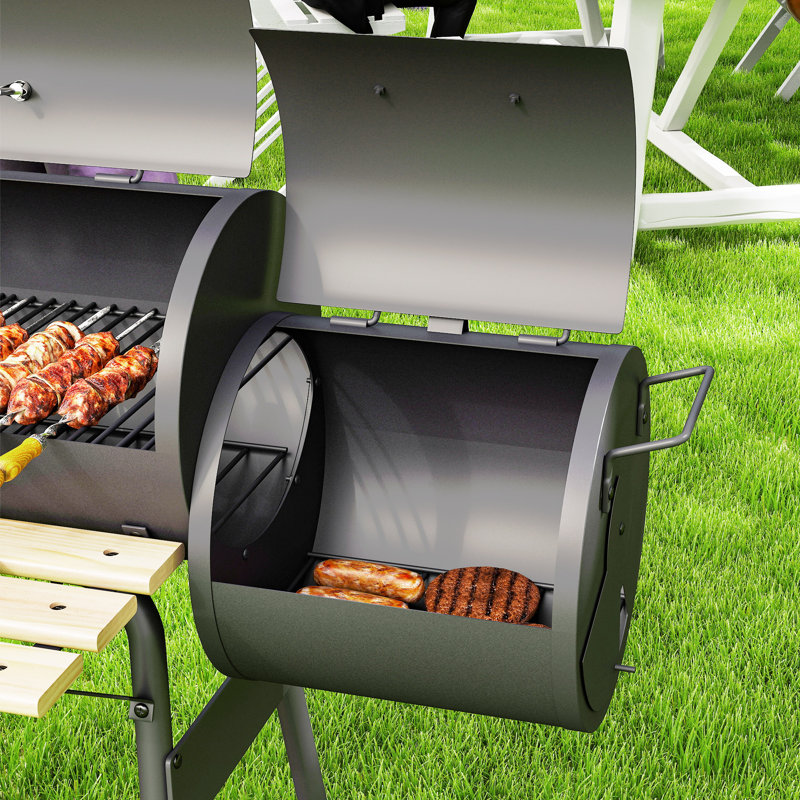 Barbecue au charbon de bois et fumoir avec roulettes