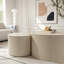 Table basse ronde en forme d'olive avec un relief artisanal-1608831306