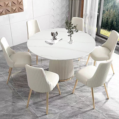 Table de salle à manger ronde moderne en pierre frittée de 53 pouces avec base en acier inoxydable et 4 chaises