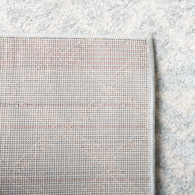 Tapis à motif géométrique Cobos Performance