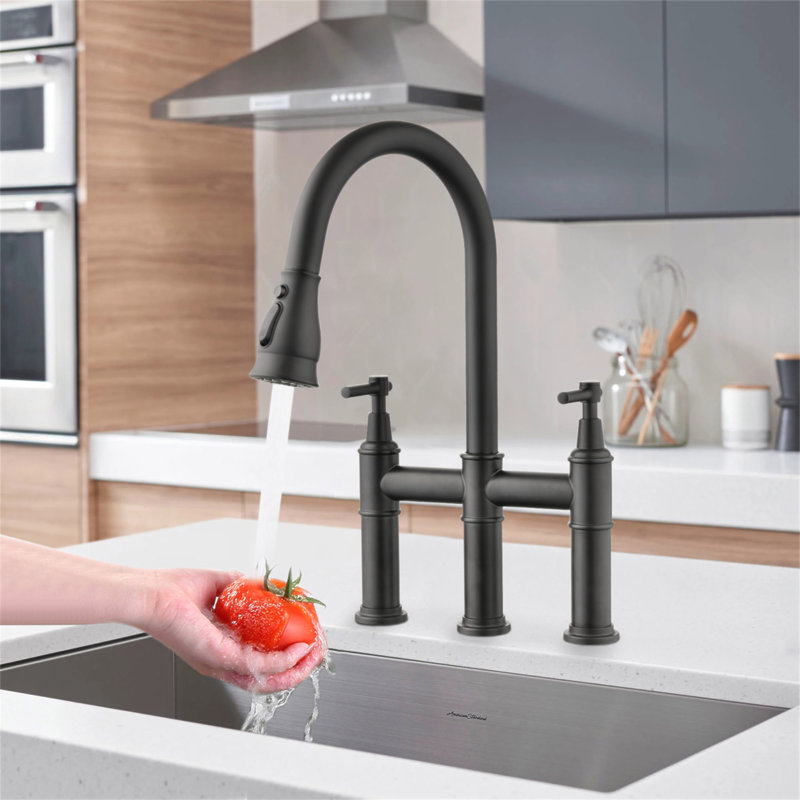 Robinet de cuisine pont à deux poignées avec douchette extractible