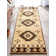 Giselly Southwestern Machine Woven Polypropylene Area Rug in Brown/Beige