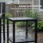 Table basse d'extérieur avec tablette de rangement, pieds réglables, noir