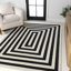 Tapis noir / ivoire Isibeal-336781266