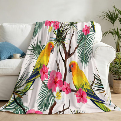 Jeté en flanelle verte molletonnée, imprimé floral