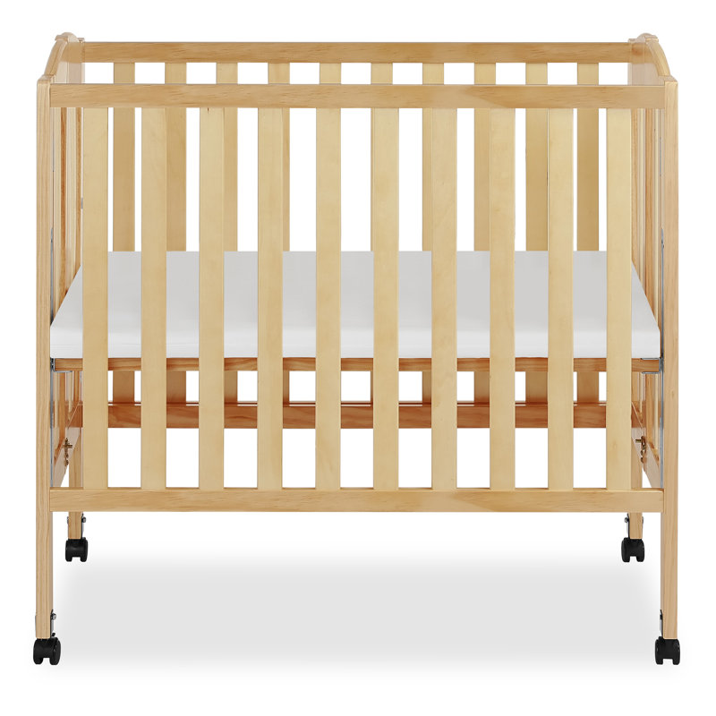 Natural Pine Convertible Folding Portable Crib with Locking Wheels