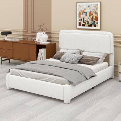 Modern low-profile bed with adjustable cloud headboard