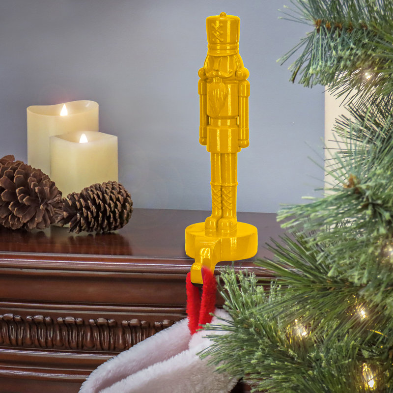 10" Yellow Resin Nutcracker Stocking Holder