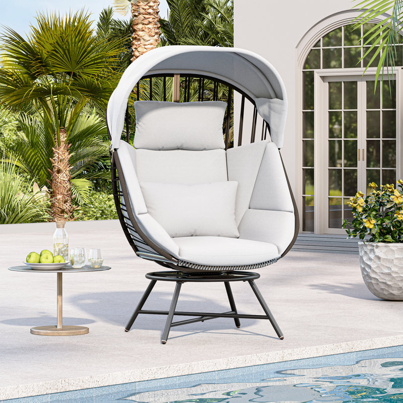Fauteuil surdimensionné pivotant à 360 ° en rotin avec coussin