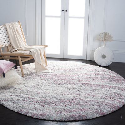Tapis rose à motif abstrait Agassiz