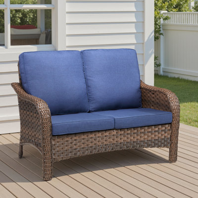 Causeuse de patio en osier 49,6 "avec coussins de siège beige