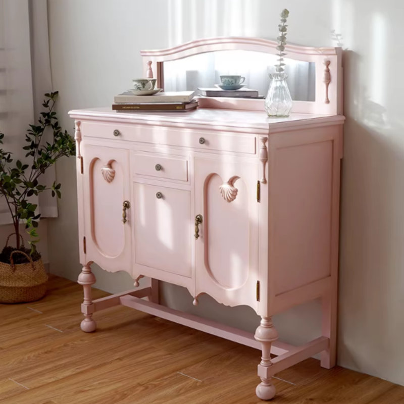 Commode rose en bois massif avec