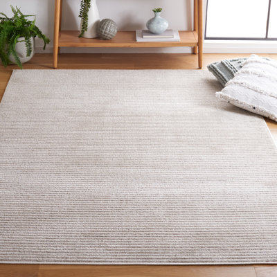 Antenor Power Loomed Polyester Area Rug in Beige
