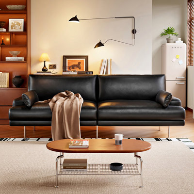 Causeuse-coussin modulable noire en cuir véritable