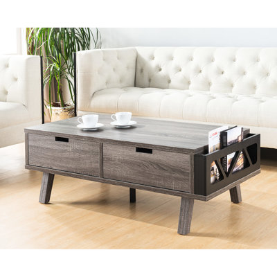 Table basse grise et noire antique