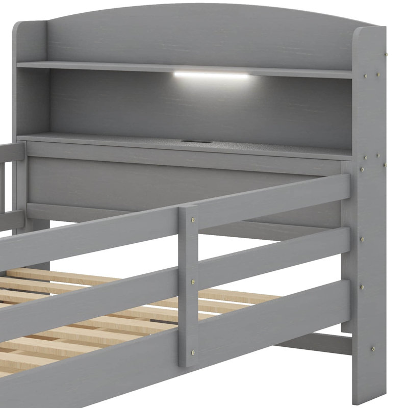 Lit plateforme moderne en bois simple équipé d'un éclairage à DEL, de rails de sécurité polyvalents pour la tête de lit et de deux tiroirs