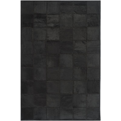 Douglas Cowhide Geometric Area Rug in Black