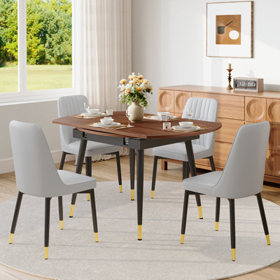 Ensemble de table de salle à manger extensible 53 po pour 4, 5 pièces Table de cuisine ronde à ovale avec 4 chaises en similicuir et pieds dorés pour les petits espaces