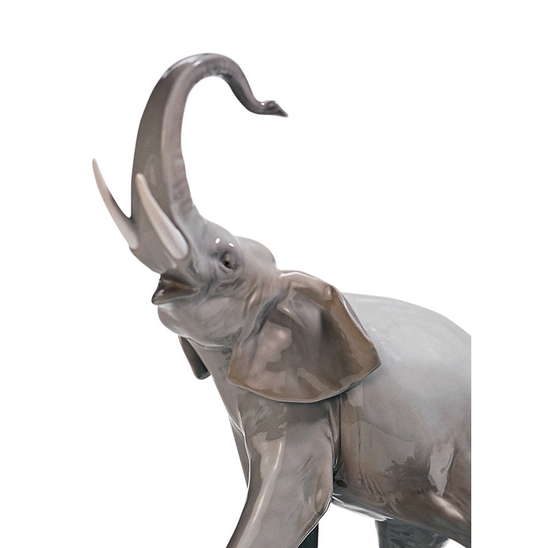 Elephants Walking Figurine