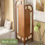 Armoire de coin en noyer massif et rotin