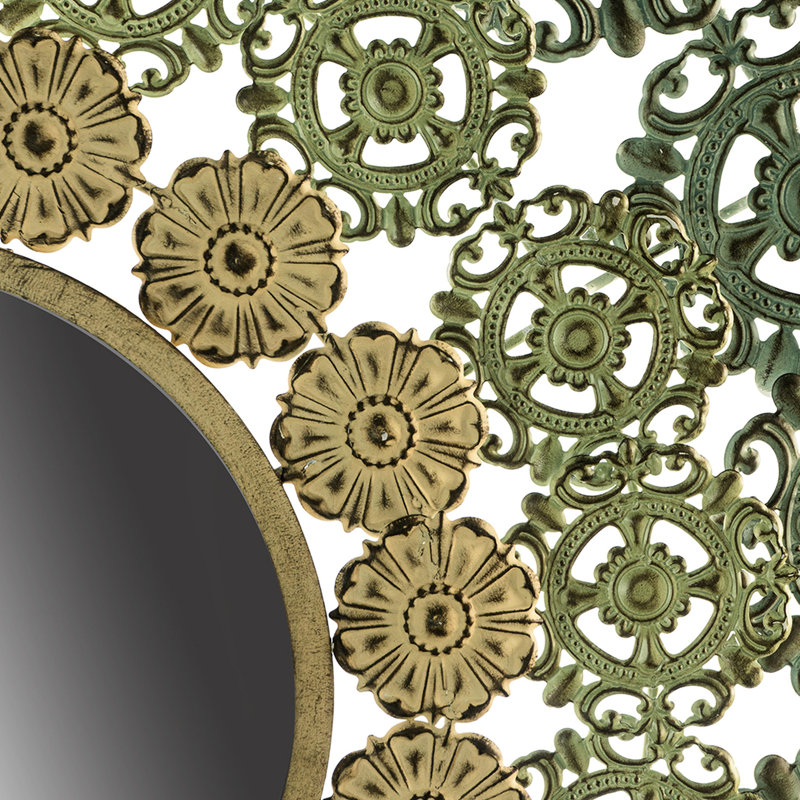 Miroir médaillon en fer forgé rehaussé d'élégance florale