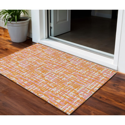 3' X 5' Orange Pink And Beige Abstract Washable Indoor Outdoor Area Rug