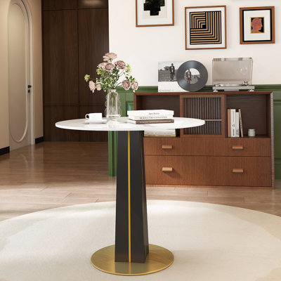 Table de ronde ronde moderne - plateau en pierre frittée blanche de 85 cm, pieds en bois noir avec base en métal doré (seulement la table de ronde)