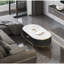 Table basse sophistiquée avec plateau blanc mat en pierre frittée gris foncé, détails de garniture dorée, élément de tiroir pratique, structure en bois massif, pieds en acier inoxydable, cadre en tache de chaleur