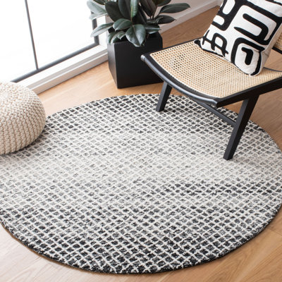 Danielius Geometric Handmade Tufted Wool Black Area Rug