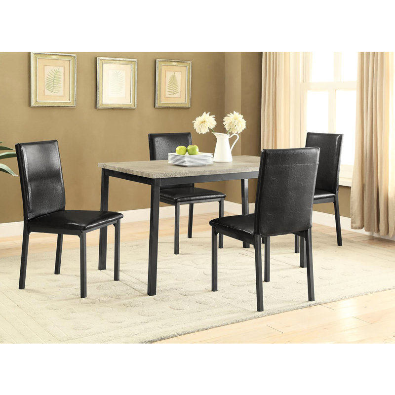 De 2 chaises rembourrées noires, transitionnelles pour une salle à manger décontractée et élégante