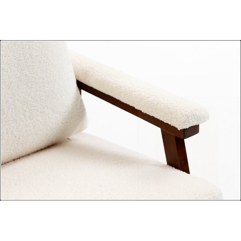 Fauteuil à bascule d'appoint moderne du milieu du siècle avec structure en bois, recouvert de tissu pour un confort optimal à la lecture.