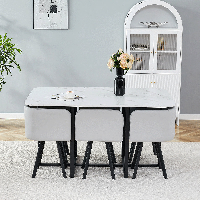 Ensemble de salle à manger de 7 pièces peu encombrant: table en mélamine (motif imitation marbre blanc) + chaises rembourrées en polyuréthane, structure en fer thermolaqué noir pour la cuisine / salle à manger