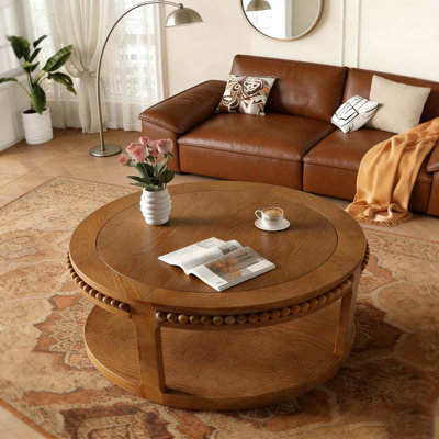 Table basse ronde à deux niveaux en bois massif avec pieds robustes