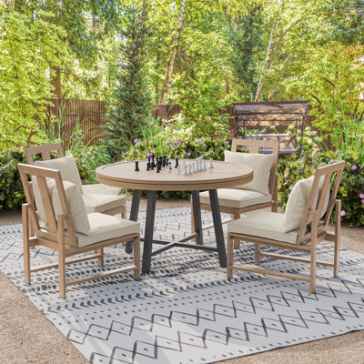 Wailey 4 - Person Patio Dining Set with Round Table , Cushions Included