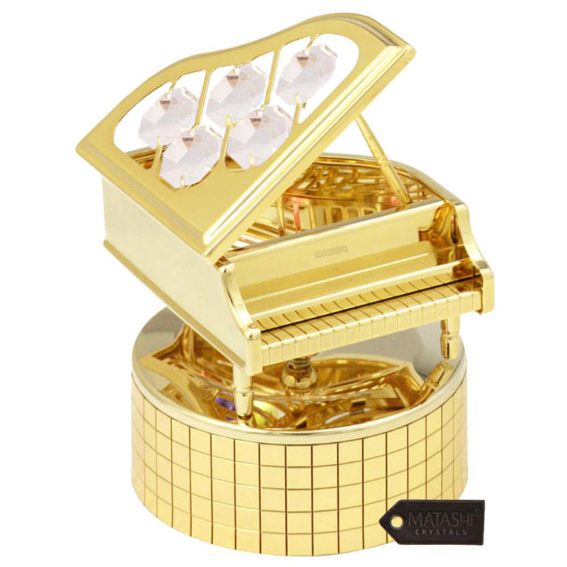 Sculpture grand piano avec cristal garniture cloutée