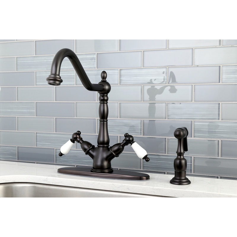Kingston Brass Heritage Two-Handle 2-or-4 Hole Deck Mount Kitchen Faucet with Brass Sprayer, Oil Rubbed Bronze/White
