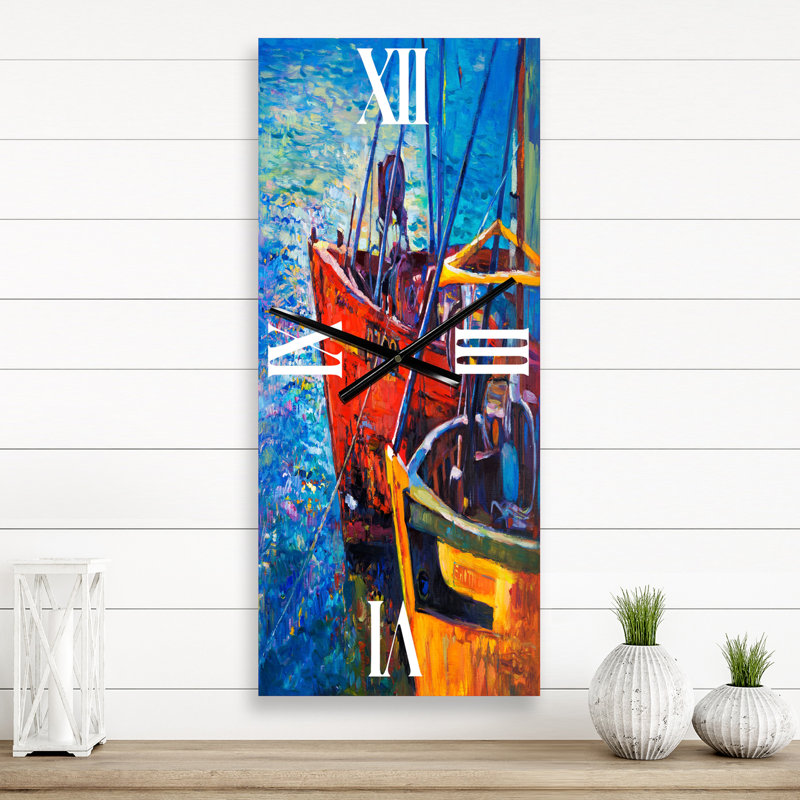 Bateaux se reposant sur l'eau pendant un coucher de soleil chaud - horloge murale nautique et côtière, Grand