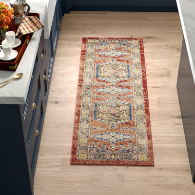 Tapis oriental en terre cuite Vern